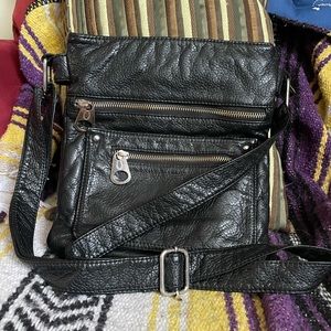 Super cute faux leather crossbody bag.